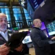 Stock traders working on the trading floor.